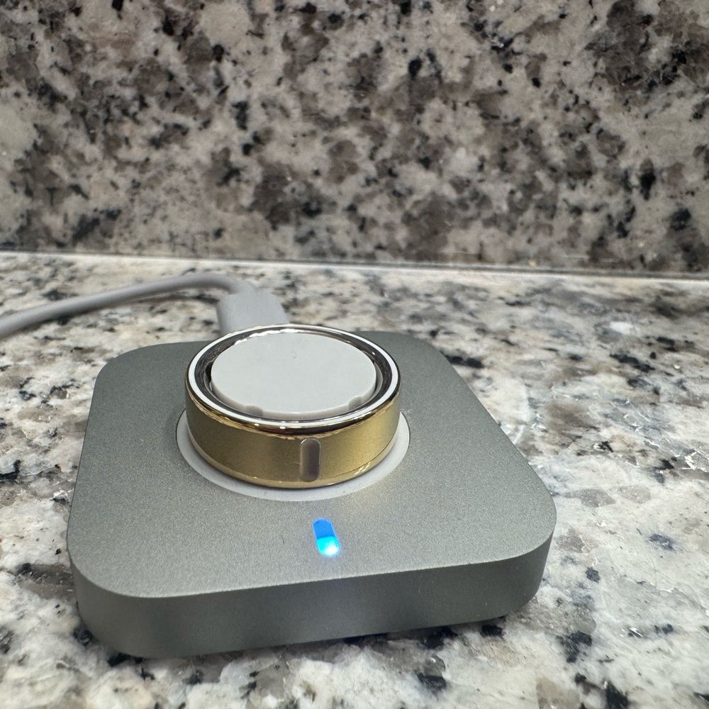 Oura Ring with Charger- Gold, Size 10 - Picture 3 of 3